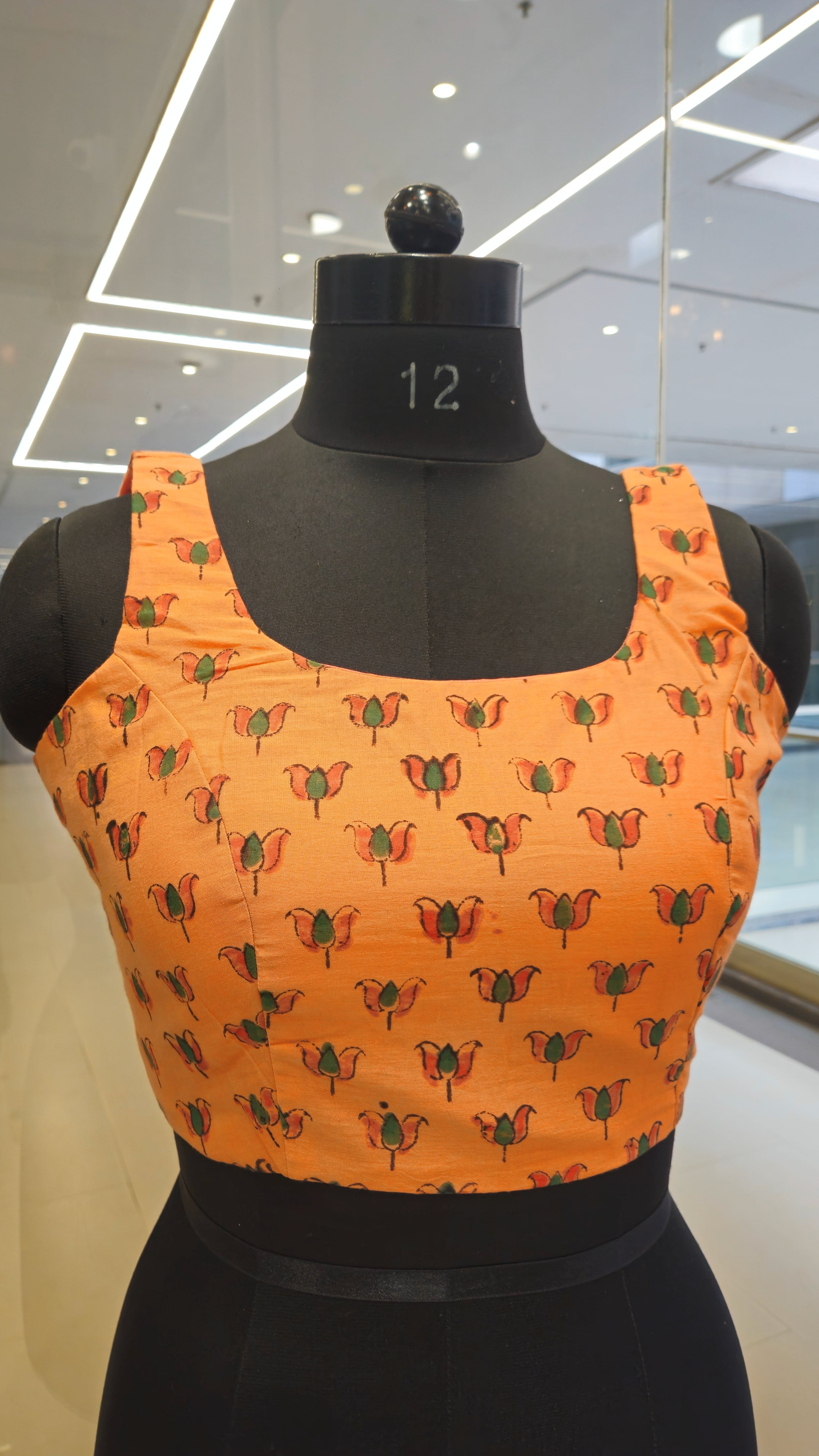 Orange block print padded blouse