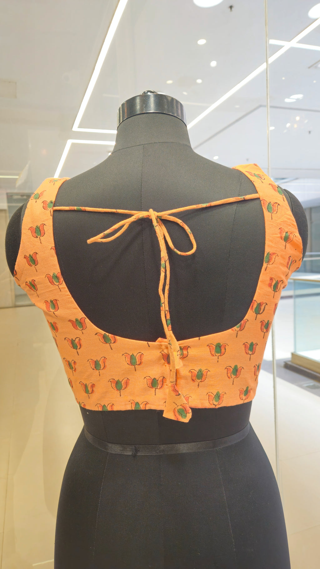 Orange block print padded blouse