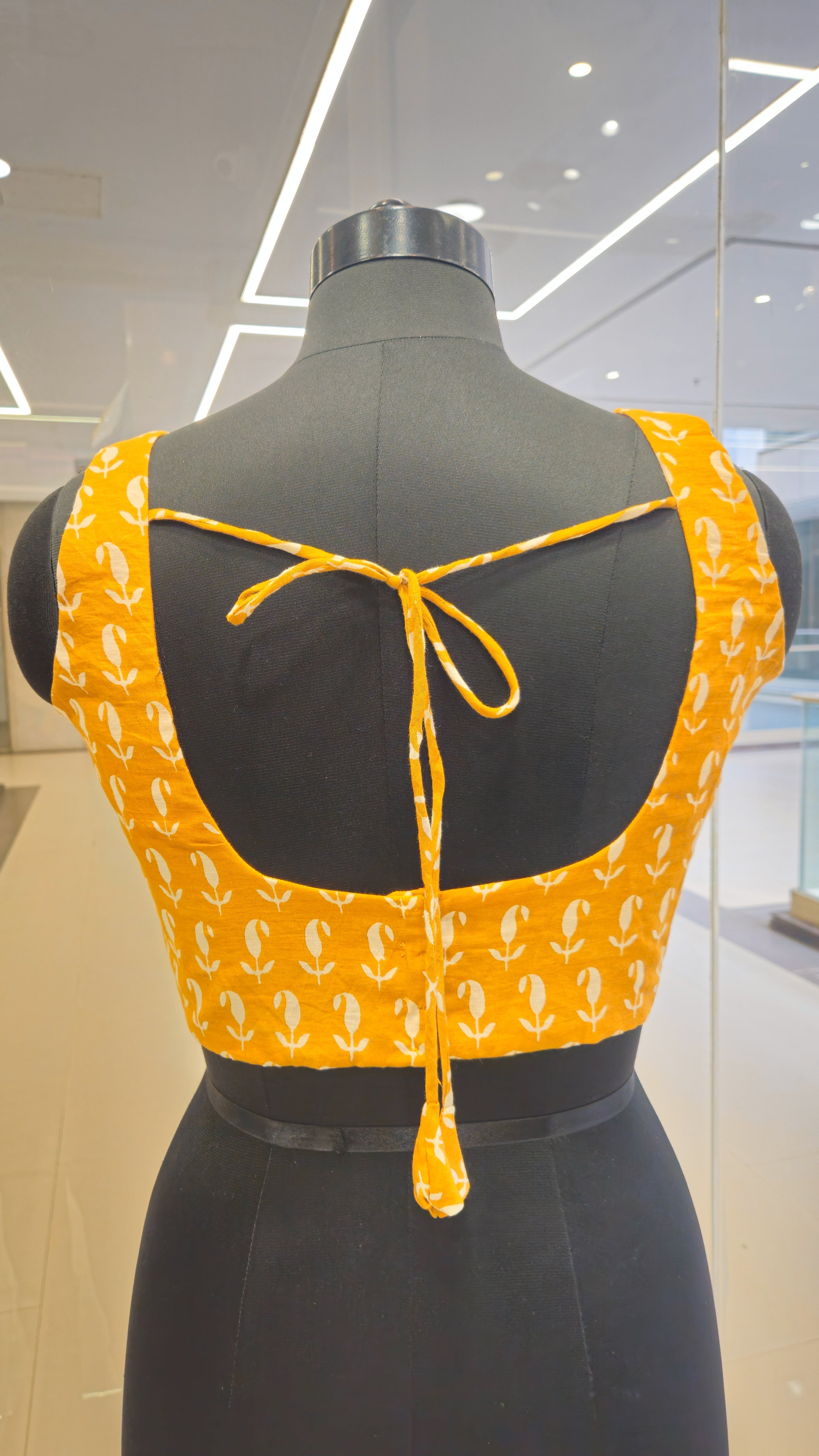 Yellow block print padded blouse